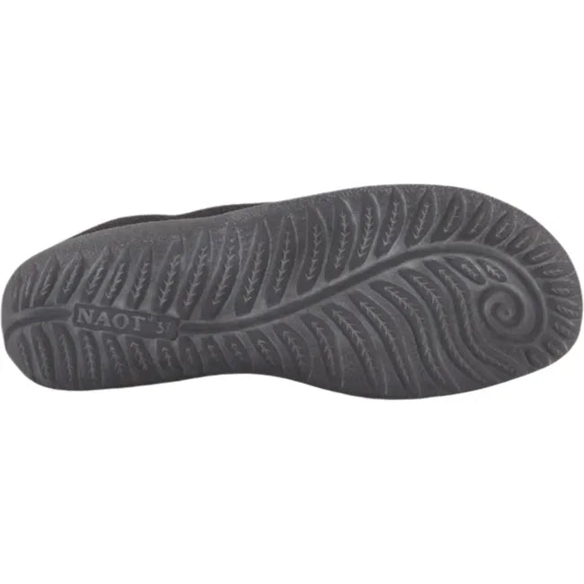 Sole view of Naot Women's Nuku Slip-On Shoe in black vegan material, featuring a slip-resistant polyurethane outsole.