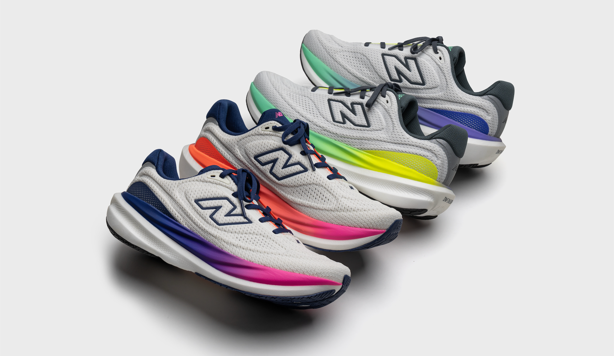 New Balance 1080v15 running shoes in four gradient colorways arranged in a diagonal banner layout on a white background