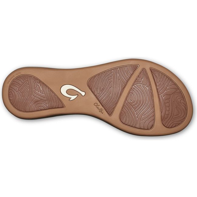 Sole of Women's Olukai Honu Flip Flop in dark Tan
