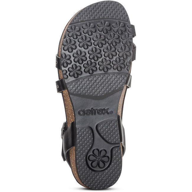 Sole of Aetrex Women’s Lauren Quarter Strap Sandal in Black with Arch Support