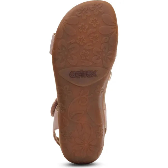 Sole of Women's Aetrex Jess Arch Support Sandal in Pink Sparkle upper