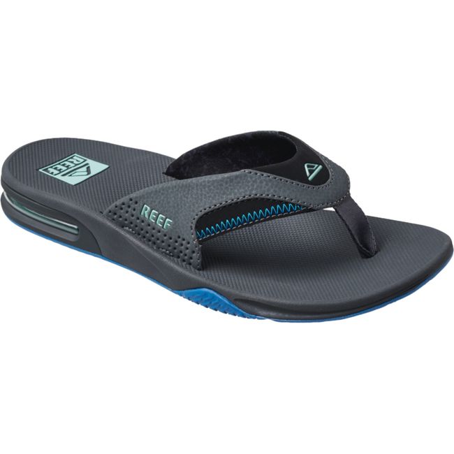 Front angled view of Men's Reef Fanning Bottle Opener Flip Flop in gunmental ocean gray