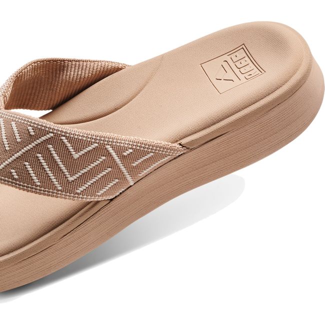 Heel close up of Women's Reef Cushion Cloud TX Flip Flop Sandal in Oasis Geo Beige