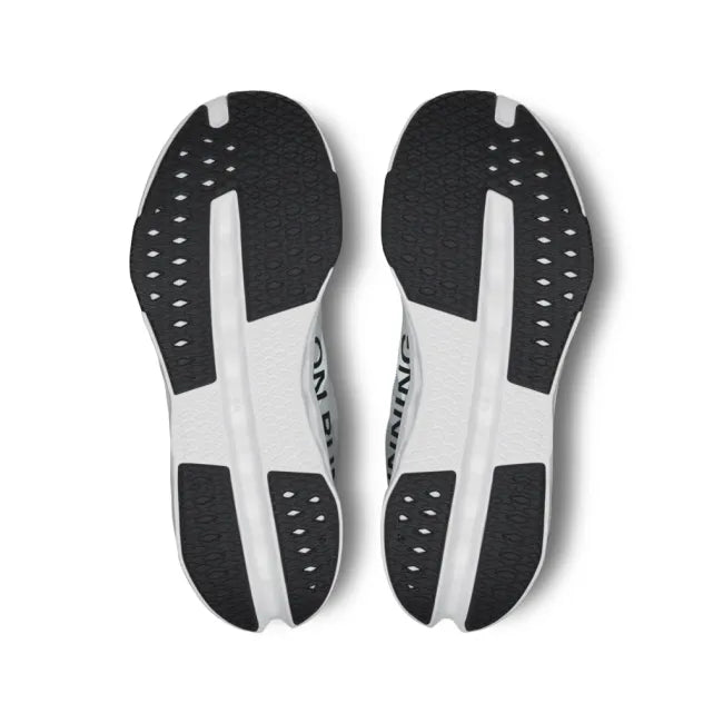 Soles of On Running Women's Cloudsurfer Next Running Shoes in in glacier grey and white