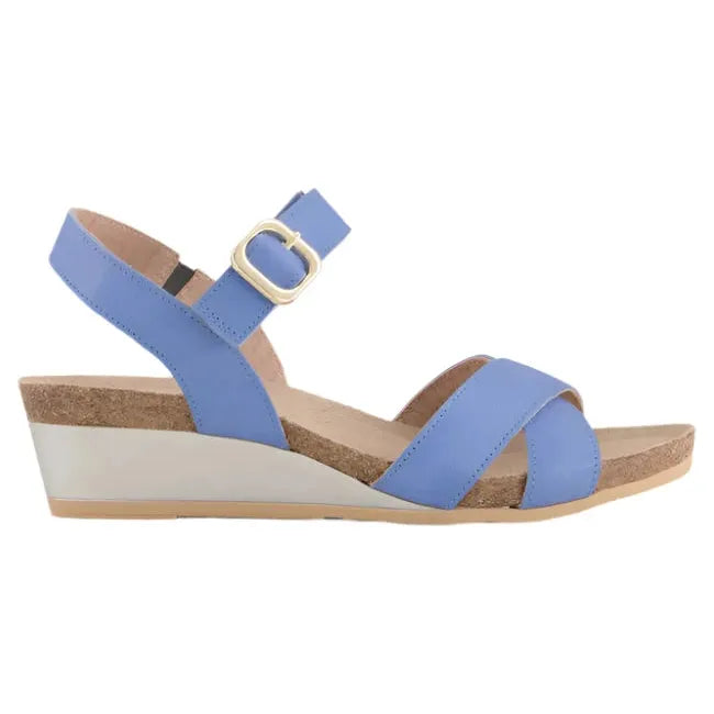 Lateral side view of the Naot Women's Throne Wedge Sandal in sapphire blue leather, featuring a hook-and-loop Velcro strap at the ankle, a 1.75-inch polyurethane wedge sole, and a cork footbed.
