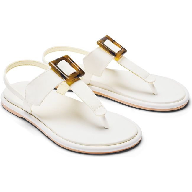 Pair of womens Olukai Lai T Bar sandal in white leather with a backstrap. Brown buckle on instep