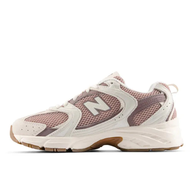 Medial side of New Balance Unisex 530 Lifestyle Shoe in Bisque Earth Shadow Pink