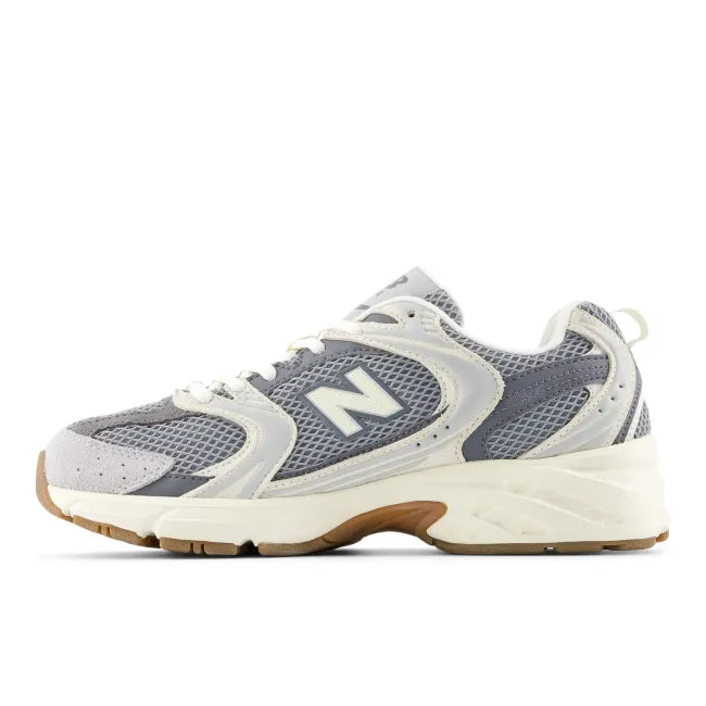 Medial side of New Balance Unisex 530 Lifestyle Shoe in raincloud castlerock grey