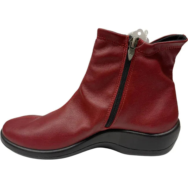 Medial side of Women's Arcopedico Paluma Bootie in cherry red vegan leather with side zipper