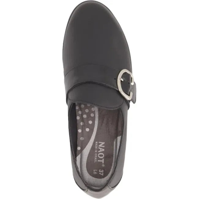 Top view of a single Naot Women's Viscol shoe in black leather, featuring a sleek design with a chic buckle accent, a 1.5-inch durable polyurethane heeled sole, and a removable cork and latex footbed.