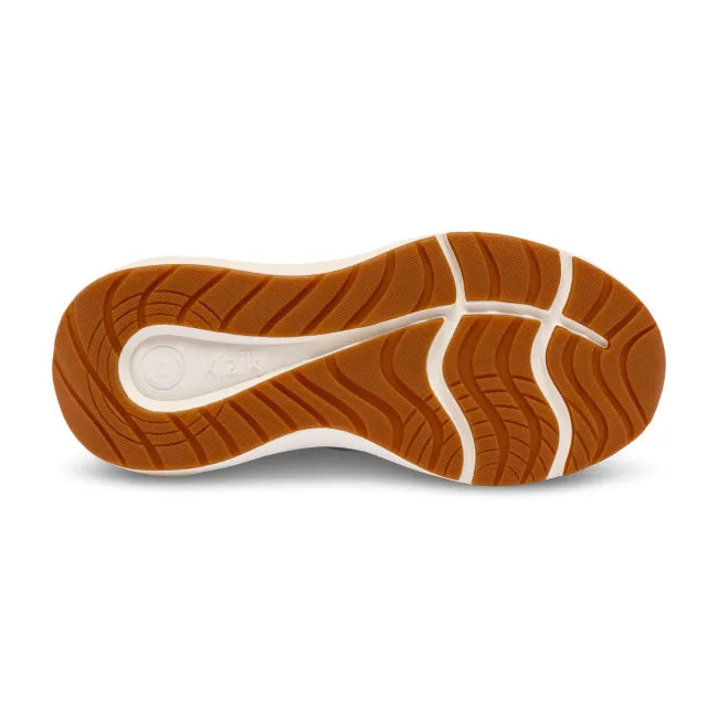 Orange-brown tread of Women’s Kizik Athens 2 Sneaker in light blue upper with white midsole
