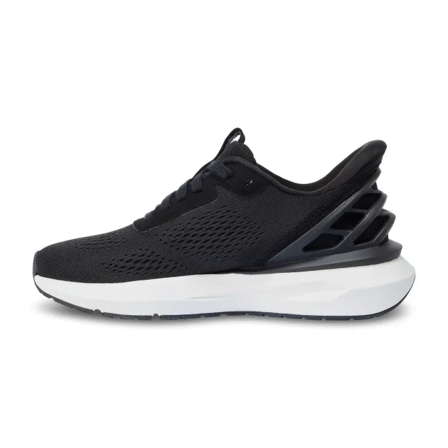 Medial side of Women’s Kizik Athens 2 Sneaker in black with easy on HandsFree Step-In tech