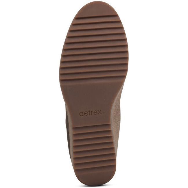 Sole of Women's Aetrex Dawn Wedge Boot in olive suede with cork sole and tan tread