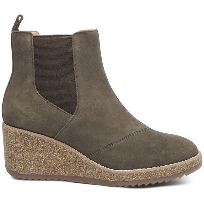 Lateral side of Women's Aetrex Dawn Wedge Boot in olive suede with cork sole