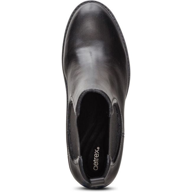 Top down view of Women's Aetrex Dawn Wedge Boot in black leather with slip on entry