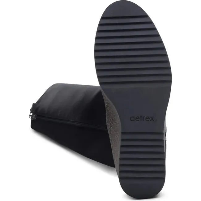 Sole of Women's Aetrex Rose Arch Support Wedge Tall Boot in black leather and suede upper