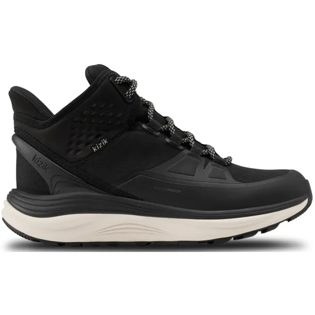 Lateral side of Women’s Kizik London AT Mid Waterproof Boot in black with hands free step in