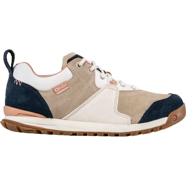 Lateral side of Women&#39;s Oboz Emma Low Casual Shoe in white, beige, and navy
