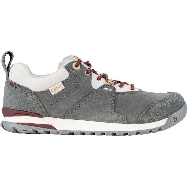 Lateral side of Women's Oboz Emma Low Casual Shoe in gray nubuck with red accents