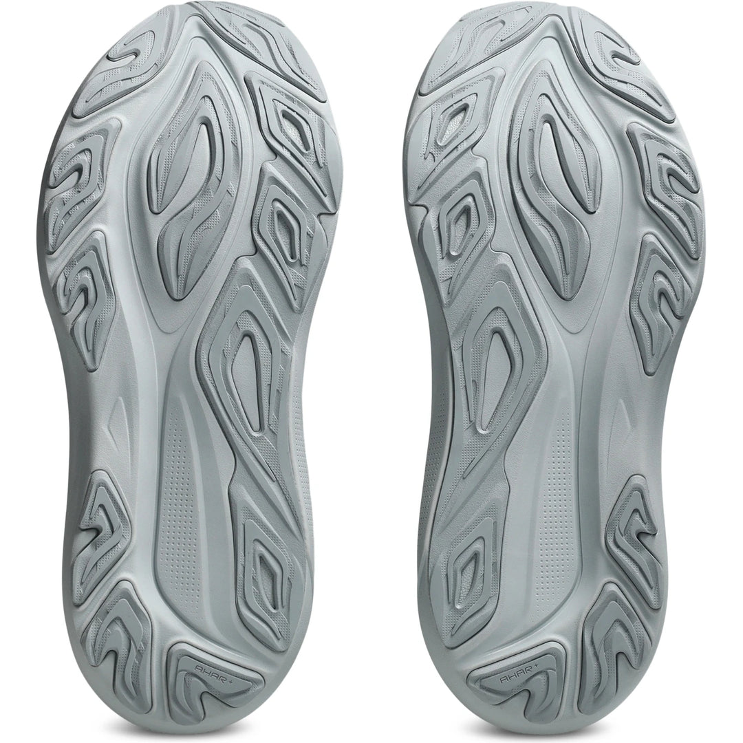 Soles of ASICS Women&