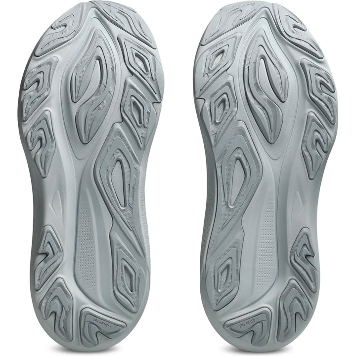 Soles of ASICS Women&