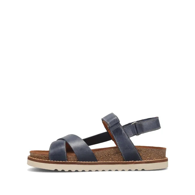 Medial side of Women's Taos Sideways Sandal in Dark Blue leather with velcro straps and cork midsole