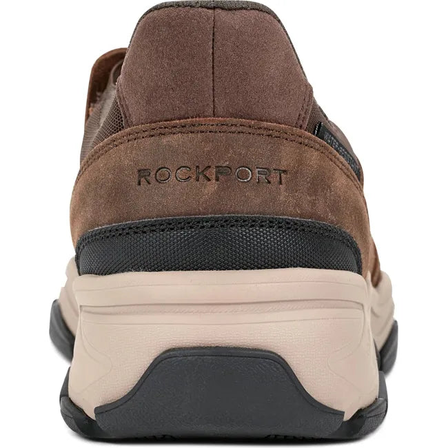 Heel of Men&#39;s Rockport Reece Step Activated Slip On Shoe in medium brown suede with light tan sole