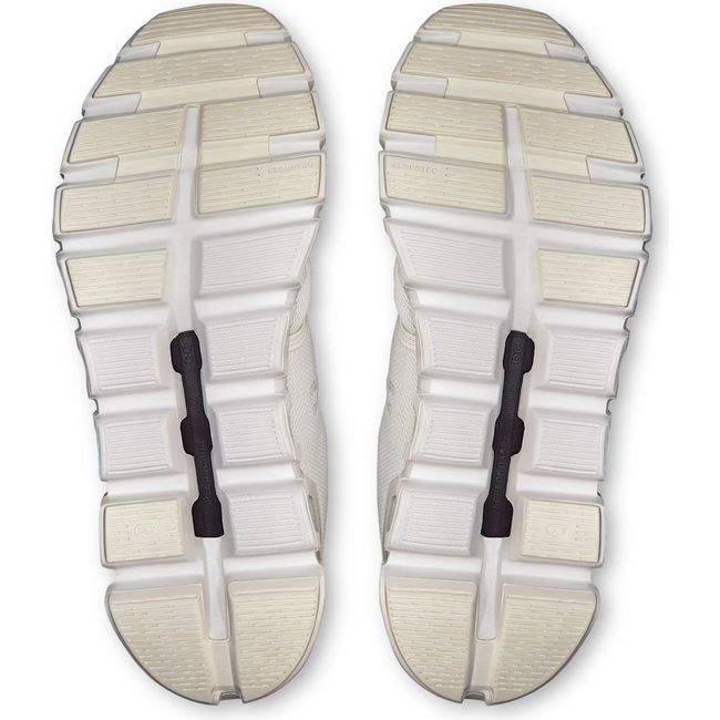 Soles of On Running Women's Cloud 6 Running Shoes in all white