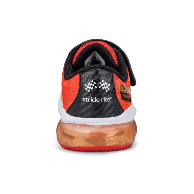 Rear heel view of the Stride Rite Lighted Phantom in black with checkered flag detail