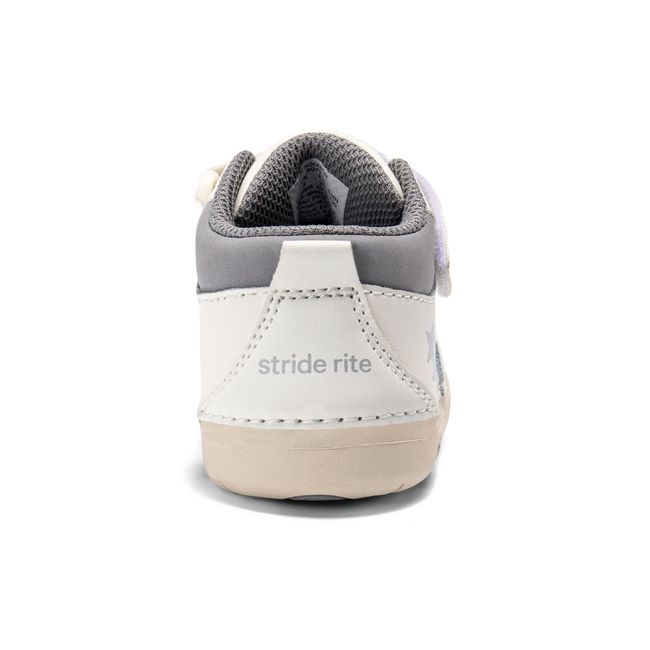 Rear heel view of the Stride Rite Rockstar in cream white with a grey collar