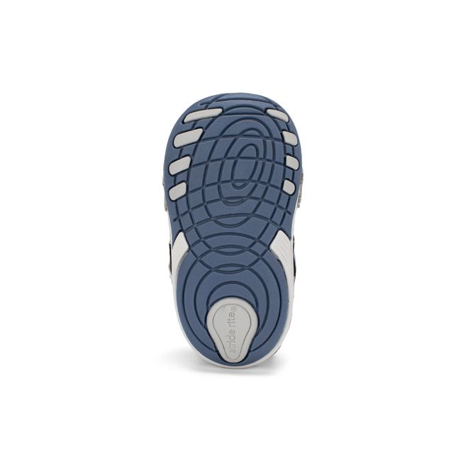 Outsole of the Stride Rite Artie in deep navy showing the flexible tread pattern