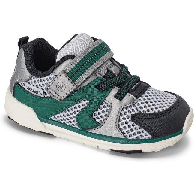 Stride Rite Velocity sneaker in black and forest green with silver mesh, angled view