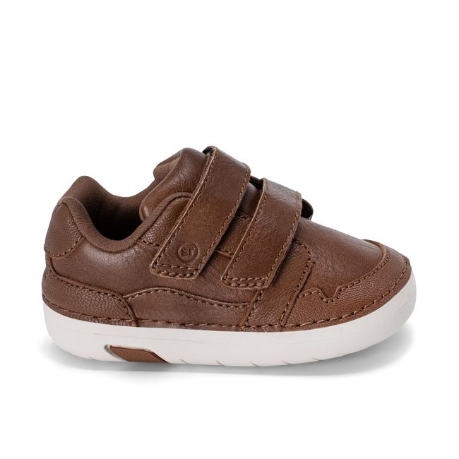 Right side profile of the Stride Rite Alfredo Mini in warm brown leather with a cream sole