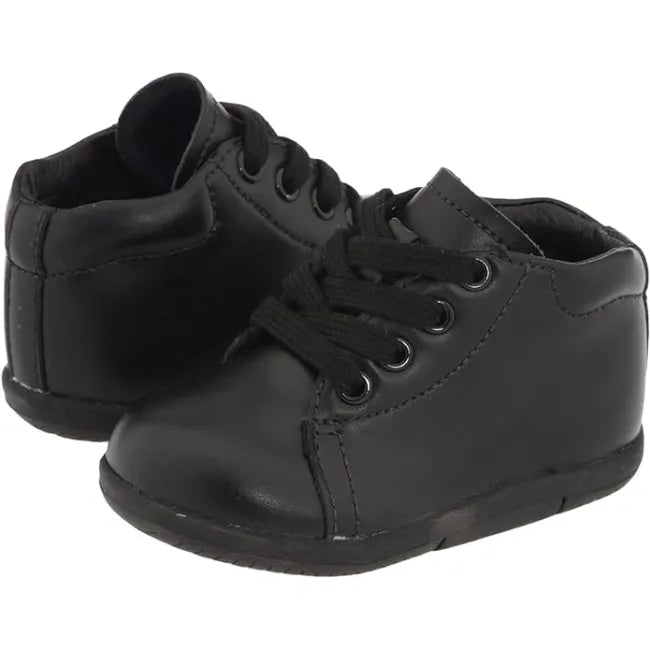 Pair of Stride Rite Elliot first walker shoes in jet black leather side by side