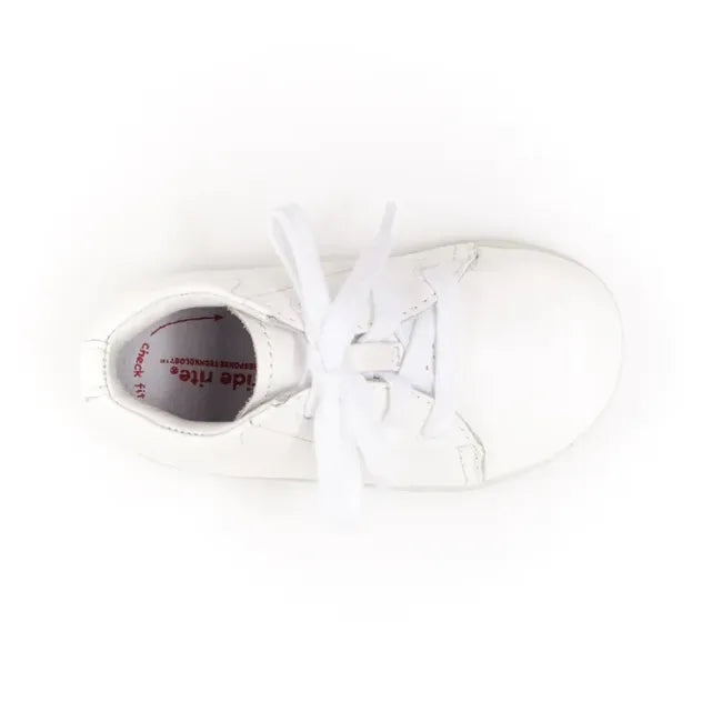 Top down view of the Stride Rite Elliot first walker shoe in cream white leather