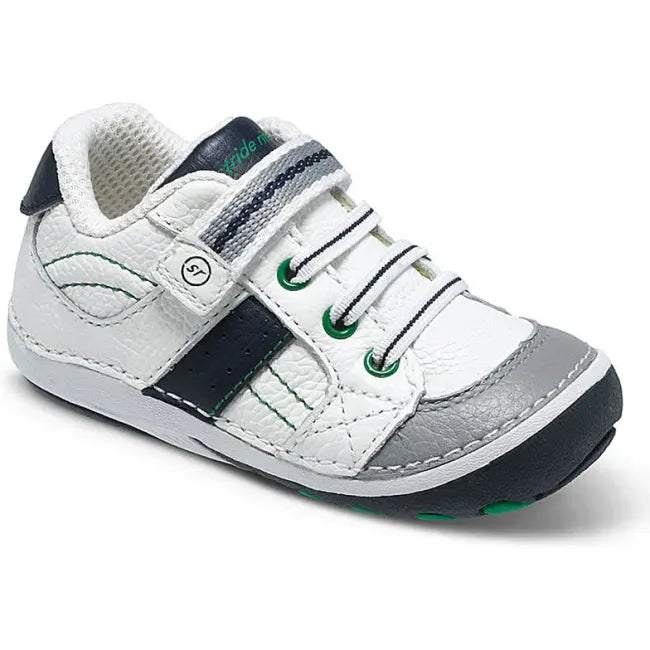Stride Rite Artie sneaker in cream white leather with deep navy stripe and green eyelets
