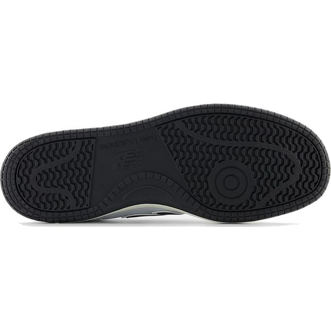 Sole of Unisex New Balance 480 Lifestyle Shoe in white, rosewood pink, and black with black outsole