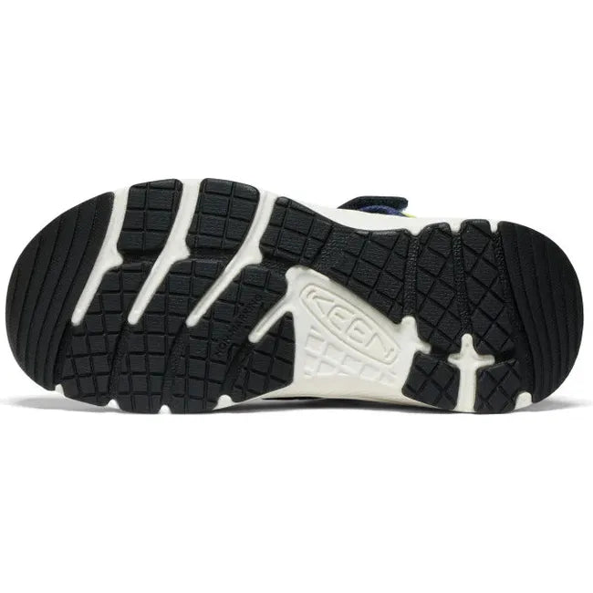 Sole of KEEN Big Kids' Motozoa Closed Toe Sandal in Naval Academy blue Evening Primrose yellow