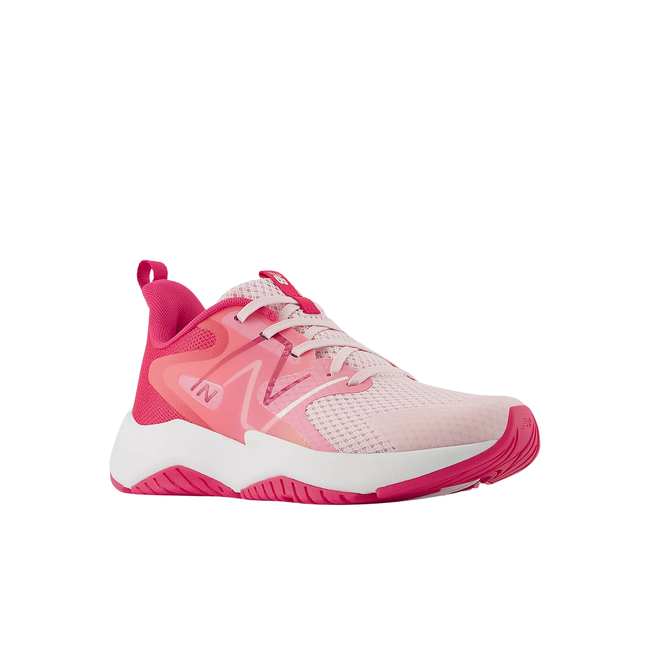 Front angled view of New Balance Youth Kids' Rave Run V2 Running Shoe in Rose Sugar Pink