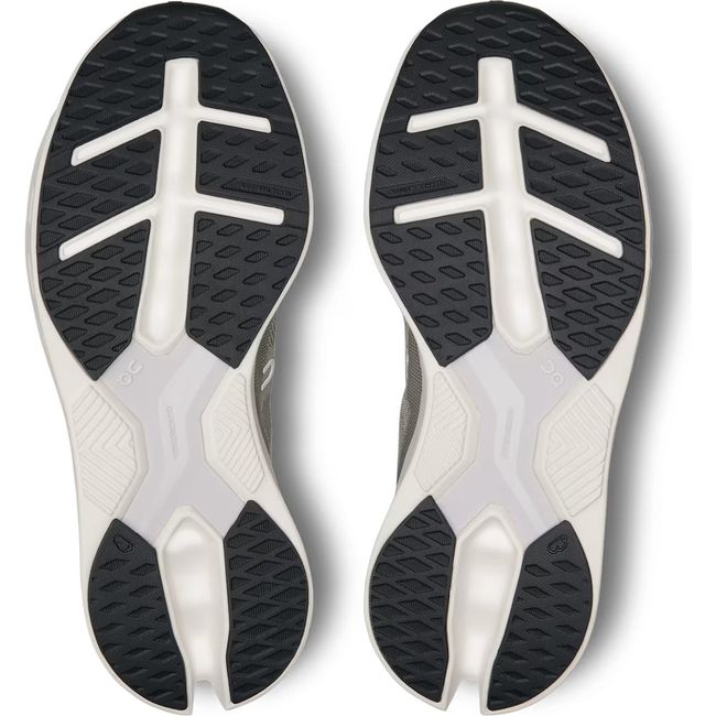 Soles of On Running Women's Cloudeclipse Running Shoes in alloy and white