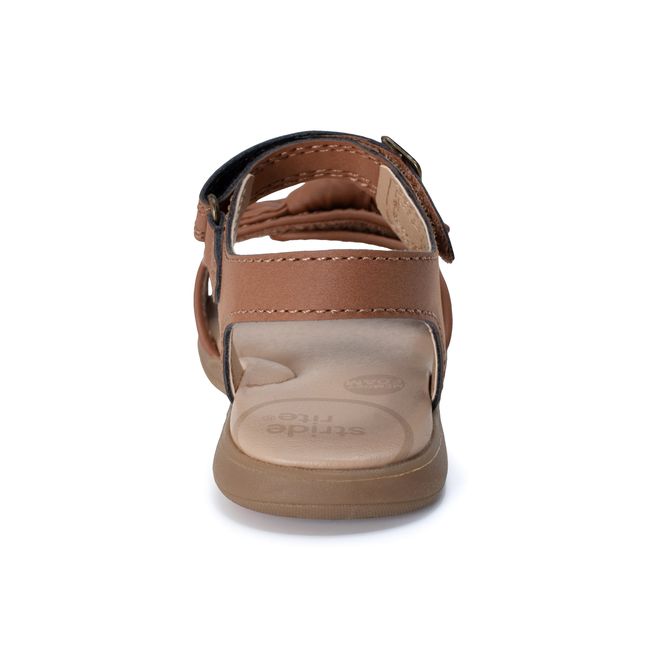Rear heel view of the Stride Rite Whitney sandal in warm tan with an ankle strap