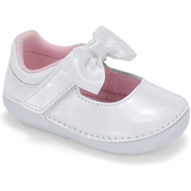 Stride Rite Solange Mary Jane in white patent leather with a satin bow, angled view