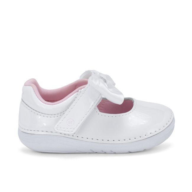 Right side profile of the Stride Rite Solange Mary Jane in white patent leather