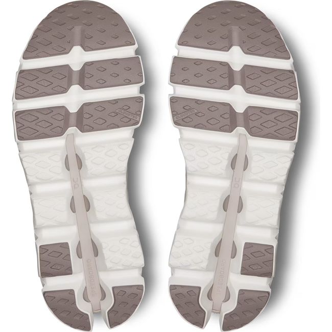 Soles of Women's On Running Cloudswift 3 Running Shoes in Pearl Fog Beige with hollow cloud pods