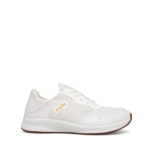 Lateral side of Women's Taos Direction Sneaker in all White 