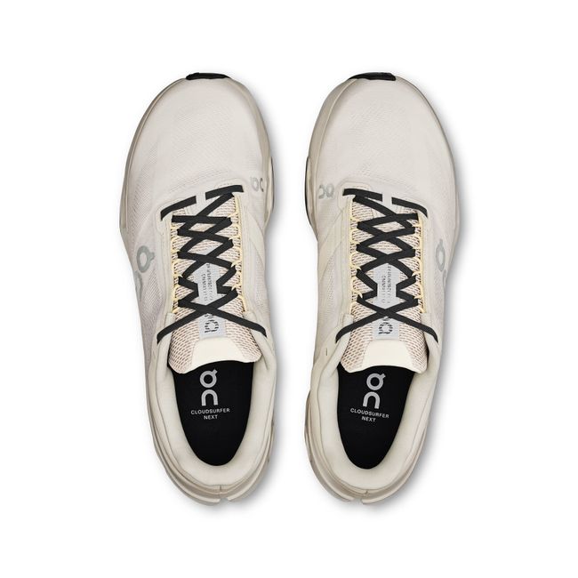 Lace up upper of On Running Women's Cloudsurfer Next Running Shoes in ivory beige and silver