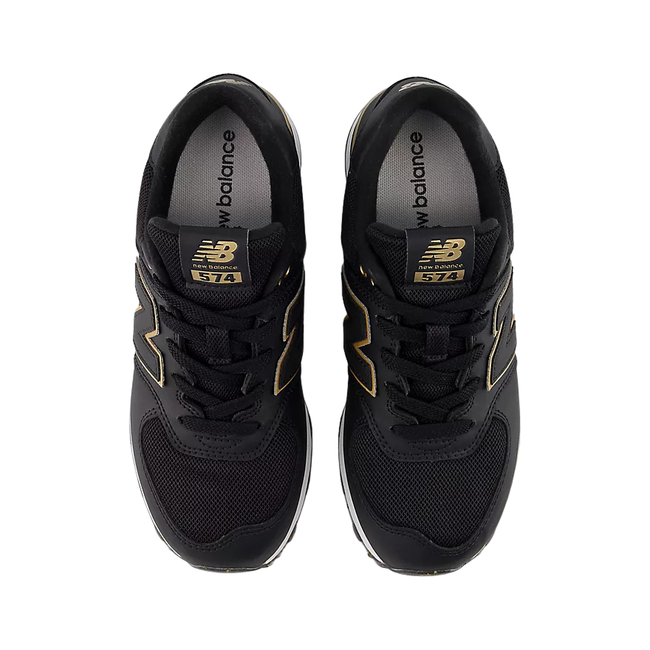 Tops of New Balance Kids' 574 Lifestyle Shoe (Toddler/Little Kid) in Black with Gold