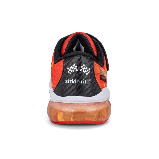 Rear heel view of the Stride Rite Lighted Phantom in black with checkered flag detail