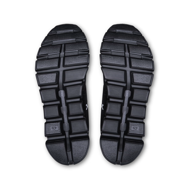 Soles of On Running Women's Cloud 6 Waterproof Running Shoes in Black 