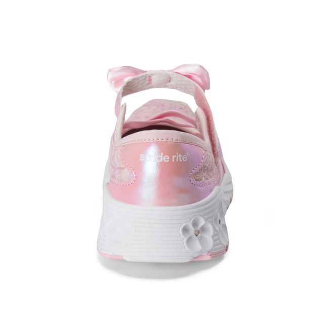 Rear heel view of the Stride Rite Lighted Flora in blush pink with a satin bow